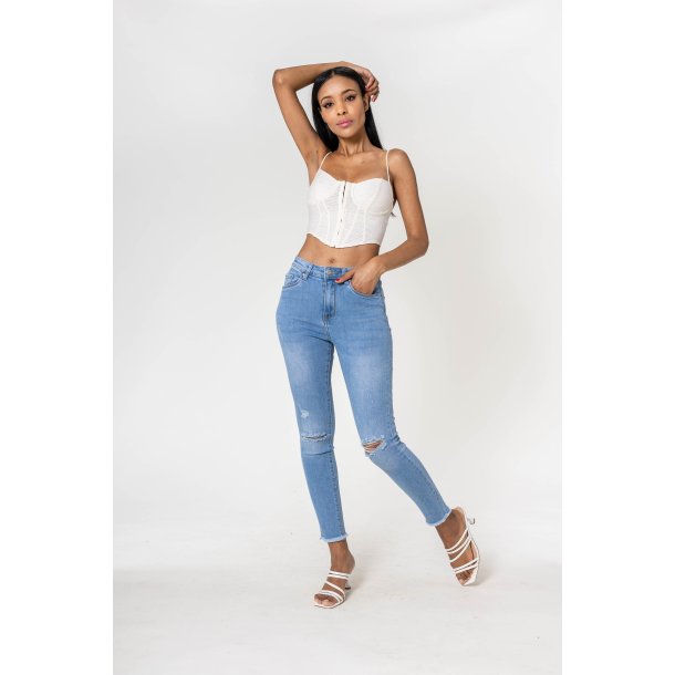 Jeans Cut at the Knees