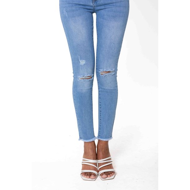 Jeans Cut at the Knees