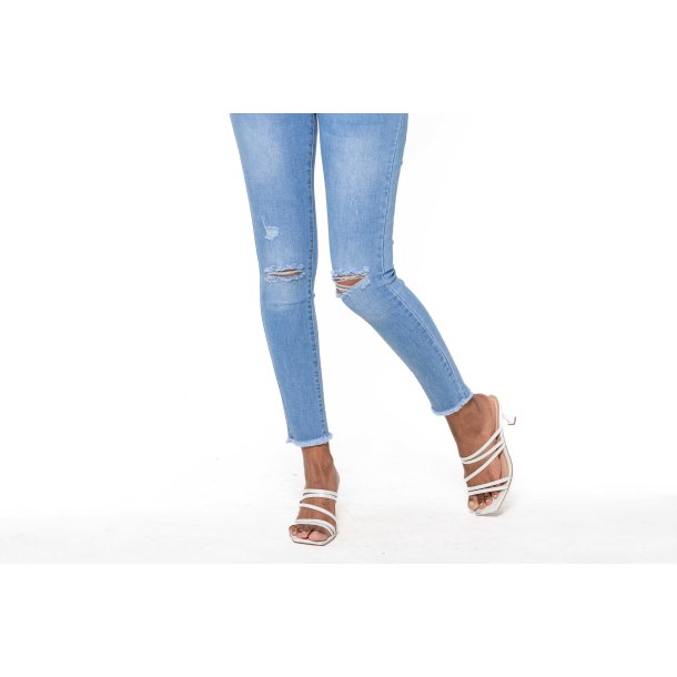 Jeans Cut at the Knees