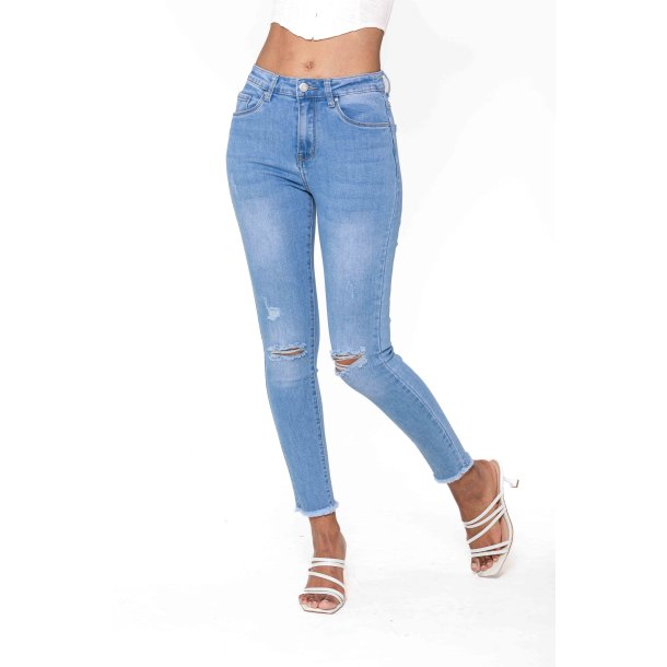 Jeans Cut at the Knees